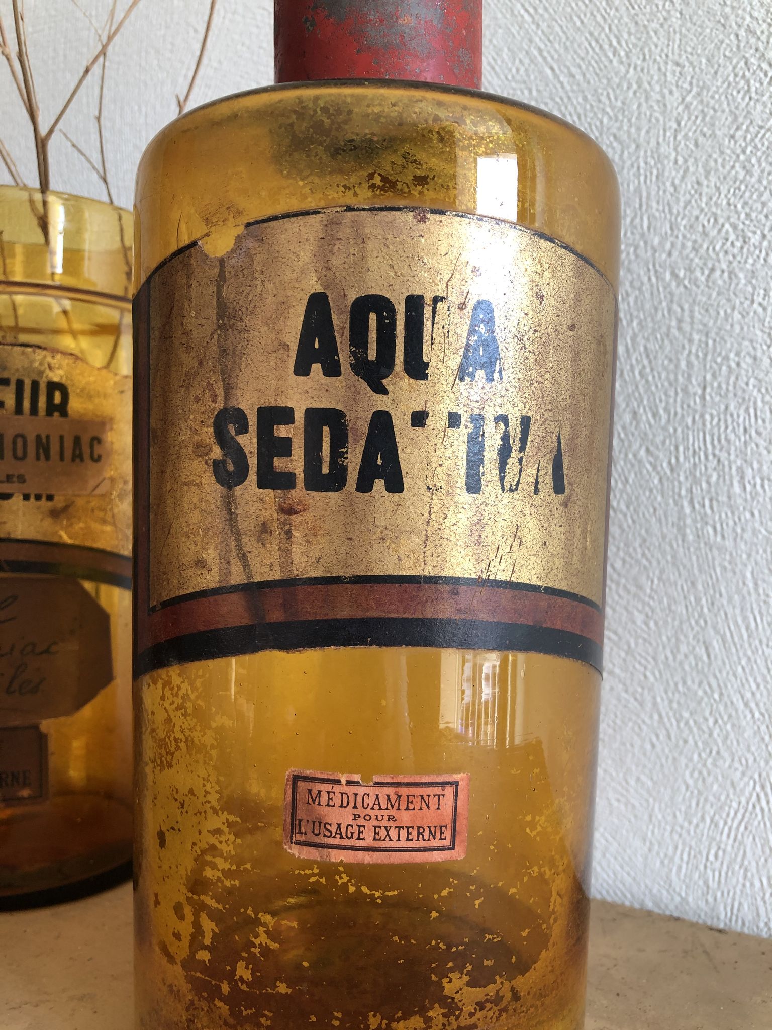 Old bottle of pharmacy "aqua sedativa" brown glass
