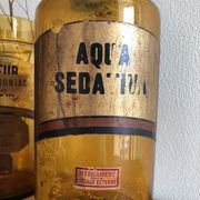 Old bottle of pharmacy "aqua sedativa" brown glass