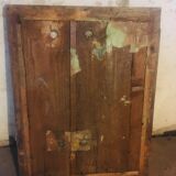 Old mirror with gilded leaves and flowers carved on top of it 1800s
