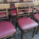 Lot de 12 chaises bistrot TON en bois et skaï rouge vintage.