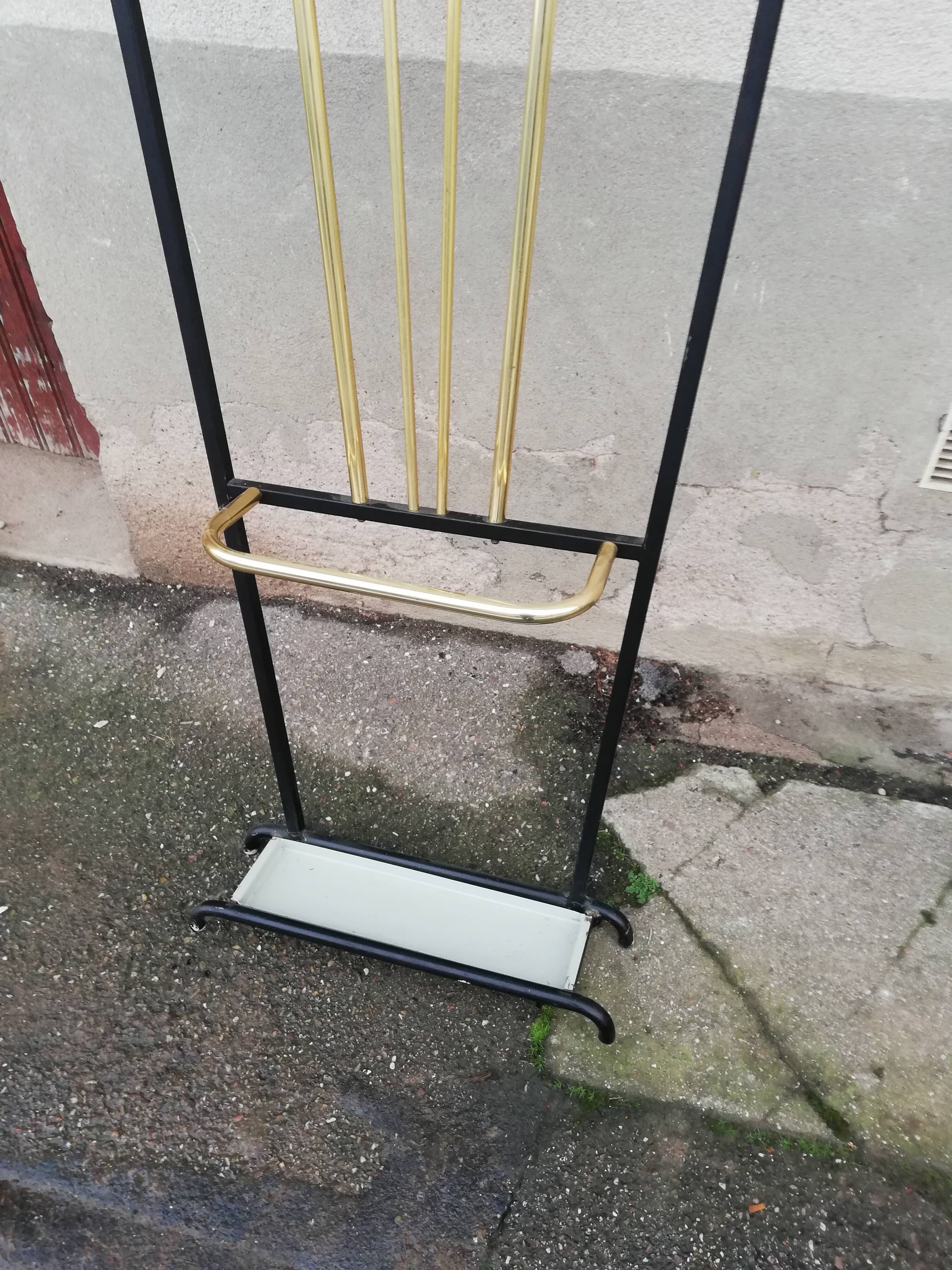 Black and gold vintage wall coat holder