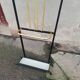 Black and gold vintage wall coat holder