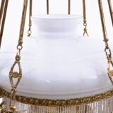 Brass chandelier from the first half of the 20th century.