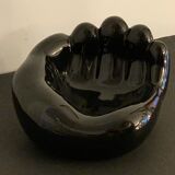 Black ceramic ashtray left hand