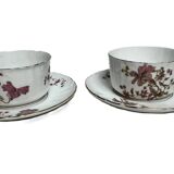 Two English porcelain teacups with floral decoration, 19th century