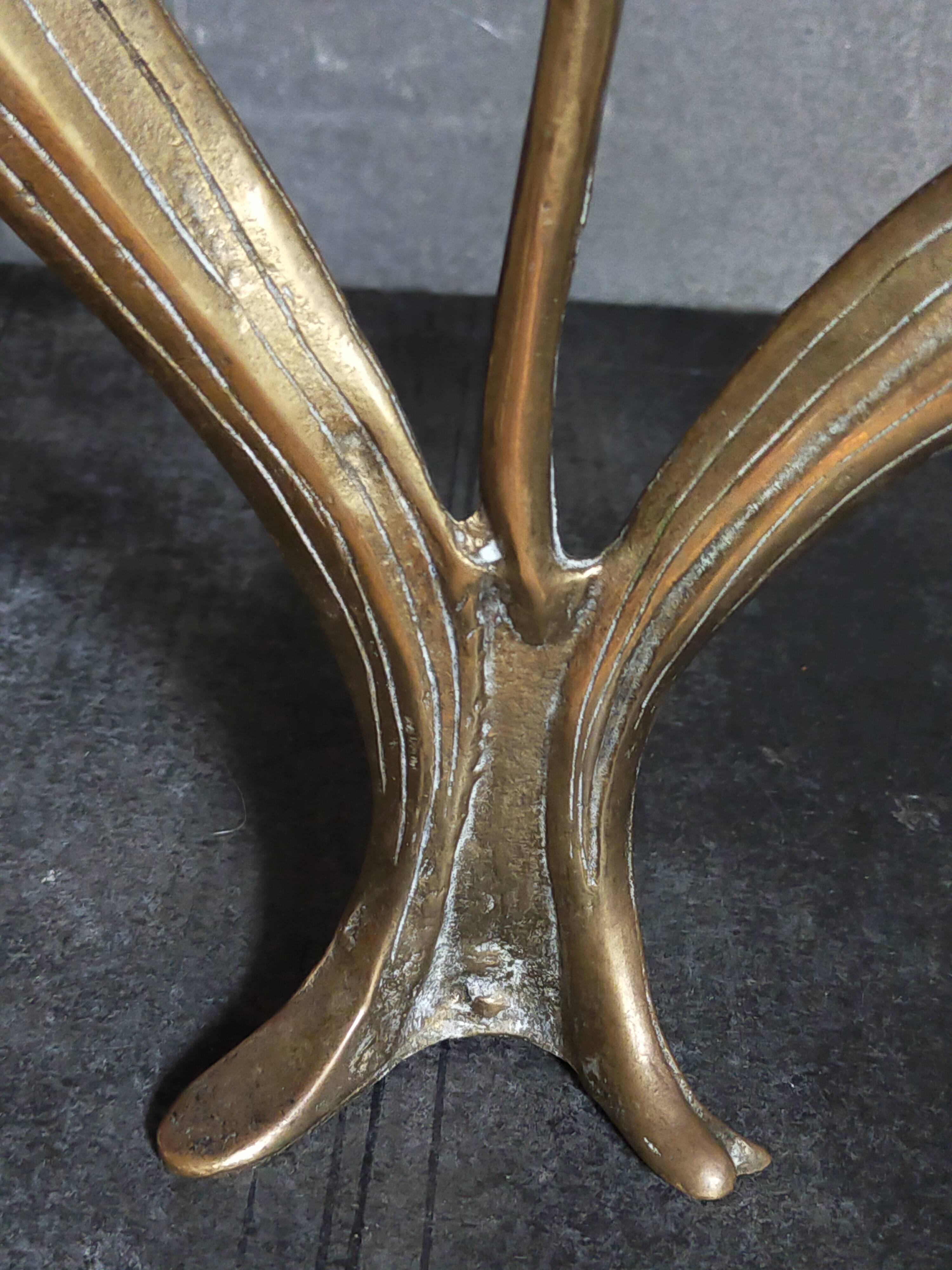 Old iris flower candle holder in solid brass