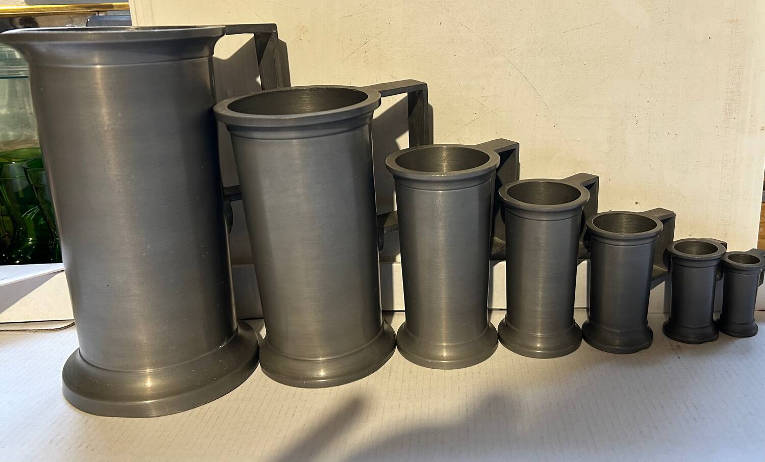 7 tin measuring pots