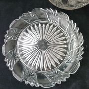 Old cheese bell on its molded pressed glass tray