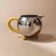 Ensemble de thé et café en acier inoxydable vintage des années 1980 avec accents jaunes, comprenant une théière, un crémier et un sucrier.