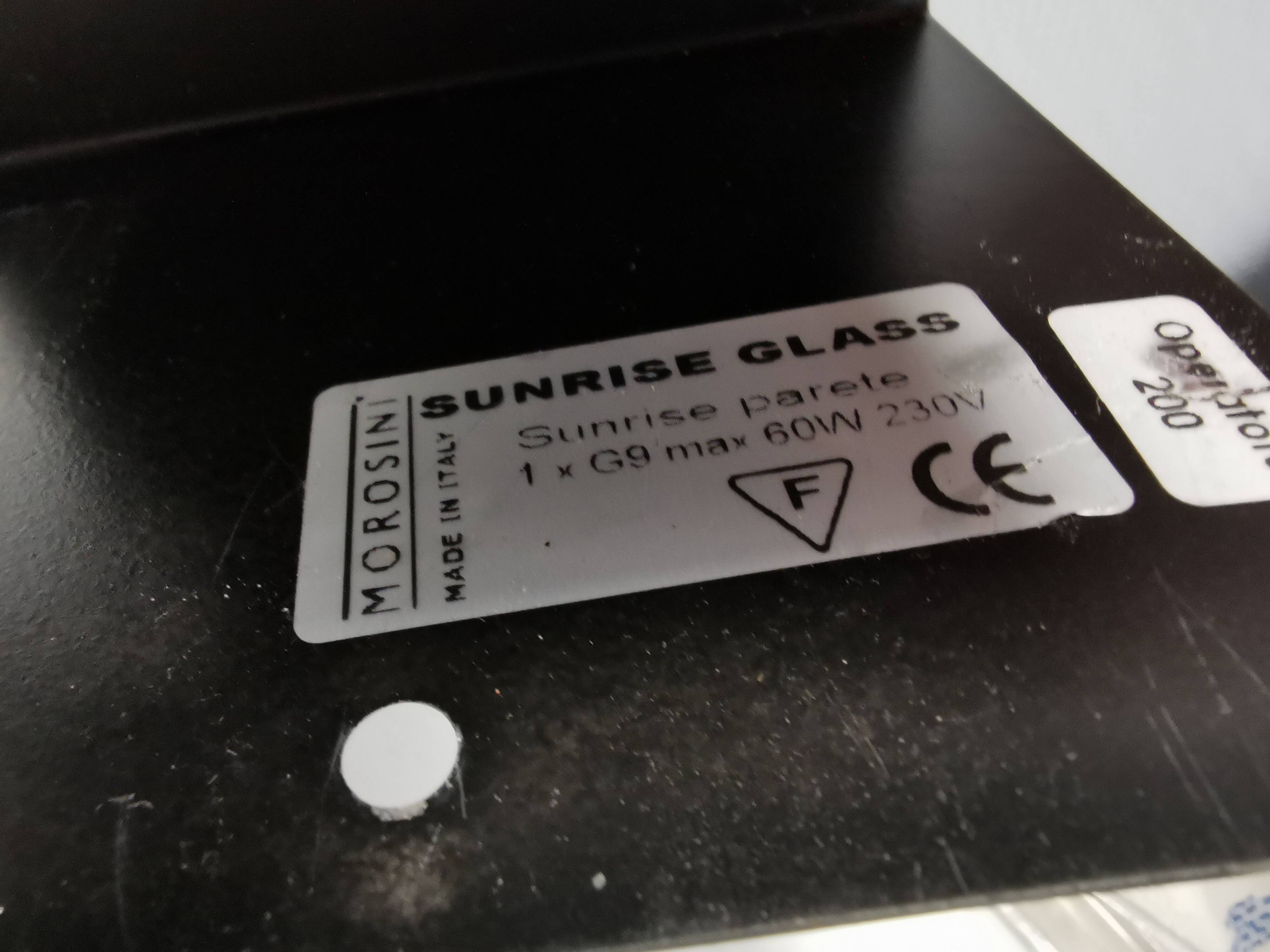 A beautiful up/down wall lamp, designed in Italy in the 1990s.