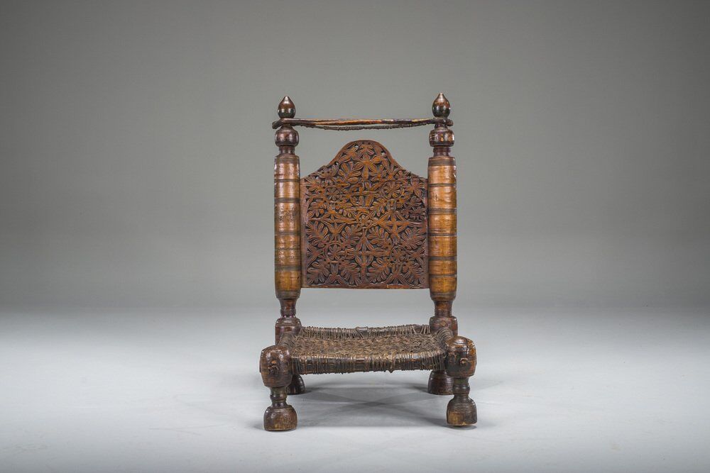 Early 20th century handmade low cedar chair, Nuristan, 1890s
