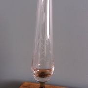 Cut glass soliflore vase with a smoked glass base.