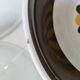 Set of three Italian deep plates from the 1970s, with ochre brown floral decoration.
