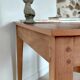 Bureau ancien à double tiroir, pieds gainés, XIXème