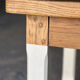 Farm table in solid oak - white patinated legs and its bench.