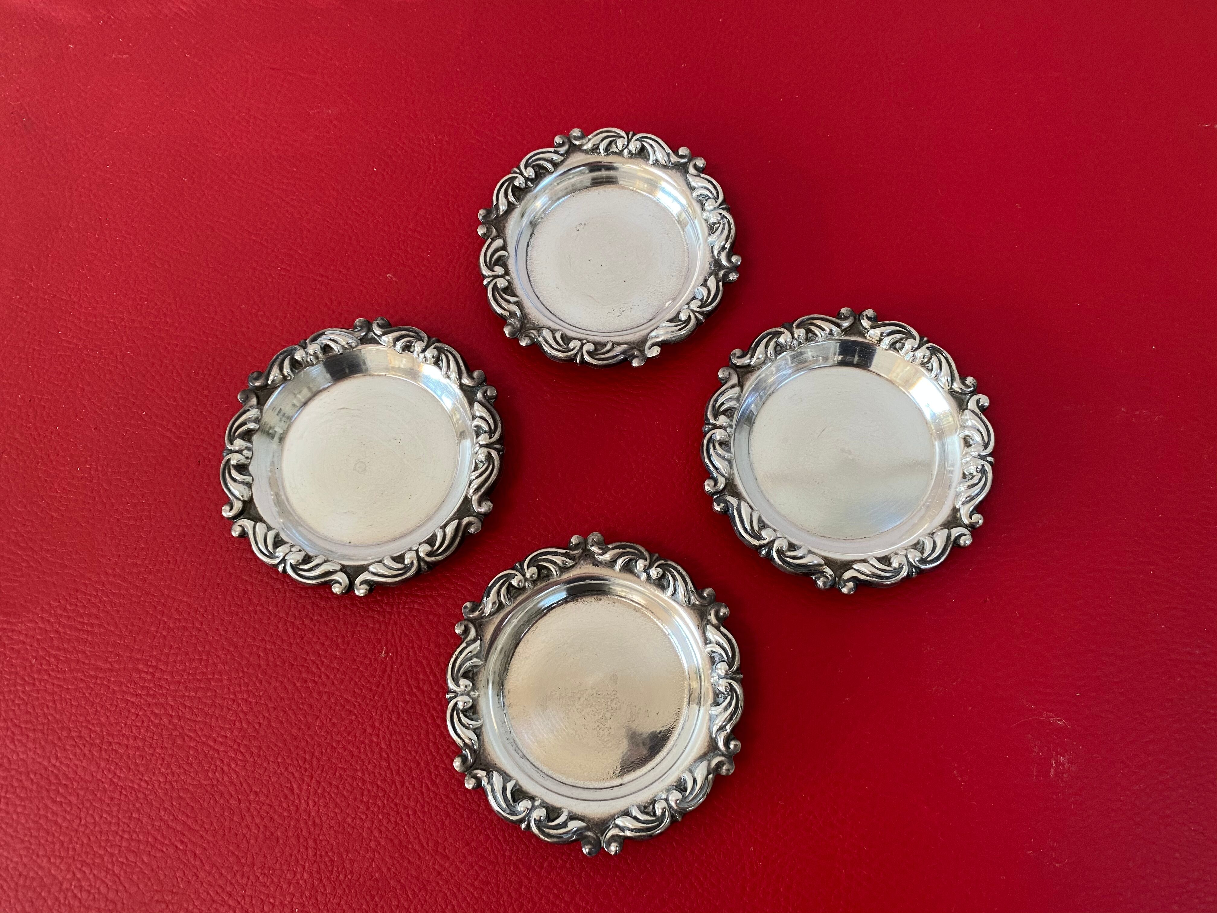 Set of 4 antique silver cups