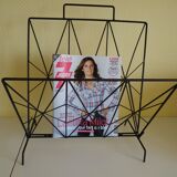 Magazines rack with very fine black metal geometric