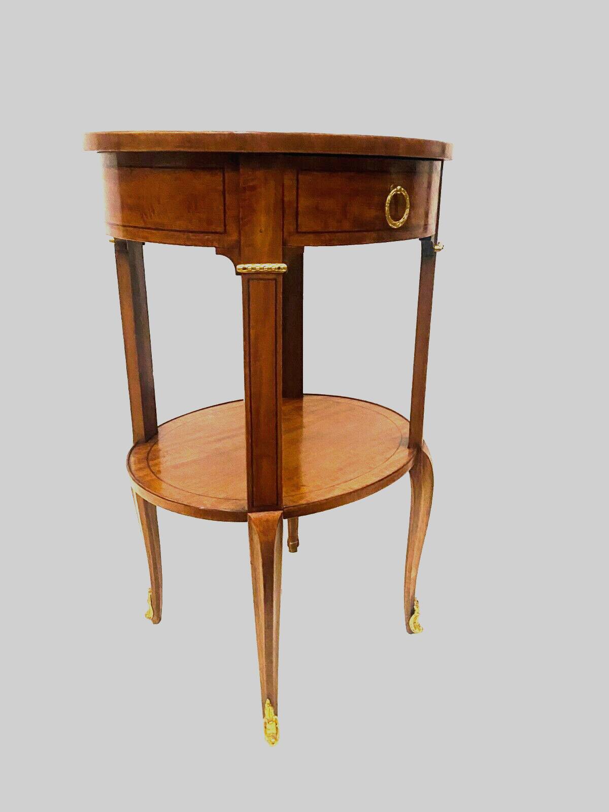 Oval pedestal table in veneer wood and black wood net 20th century