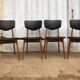 Set of 4 Scandinavian teak and black skai chairs
