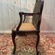 Louis XV mahogany and cane bench