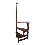 Spiral staircase for library made of mahogany wood