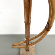 Sculptural floor lamp in bent rattan