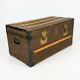 Old travel trunk in oilcloth