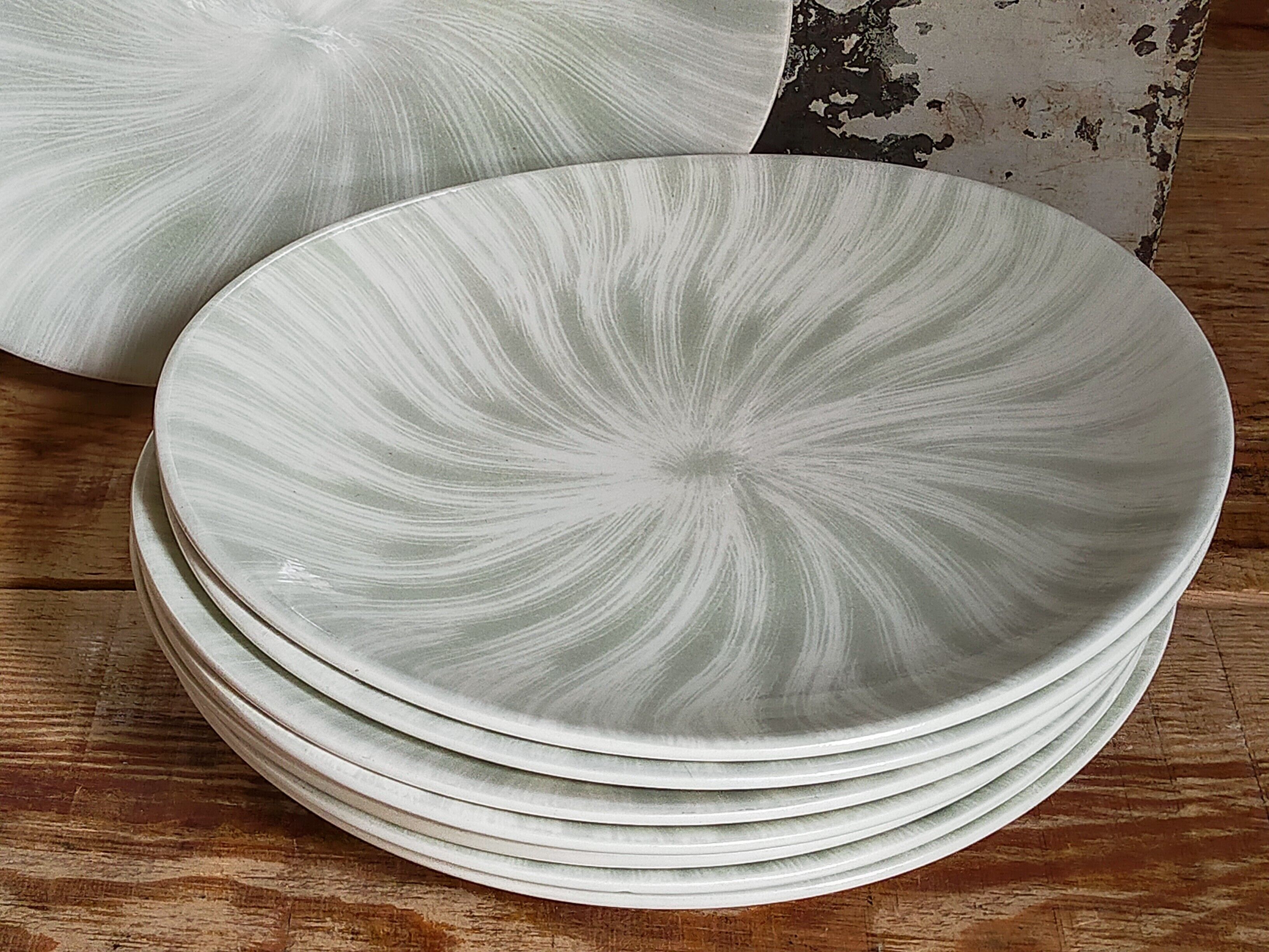 Nine earthenware plates from Salins-les-Bains vintage