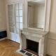 Antique marble fireplace with overmantel and mirror - Haussmannian apartment