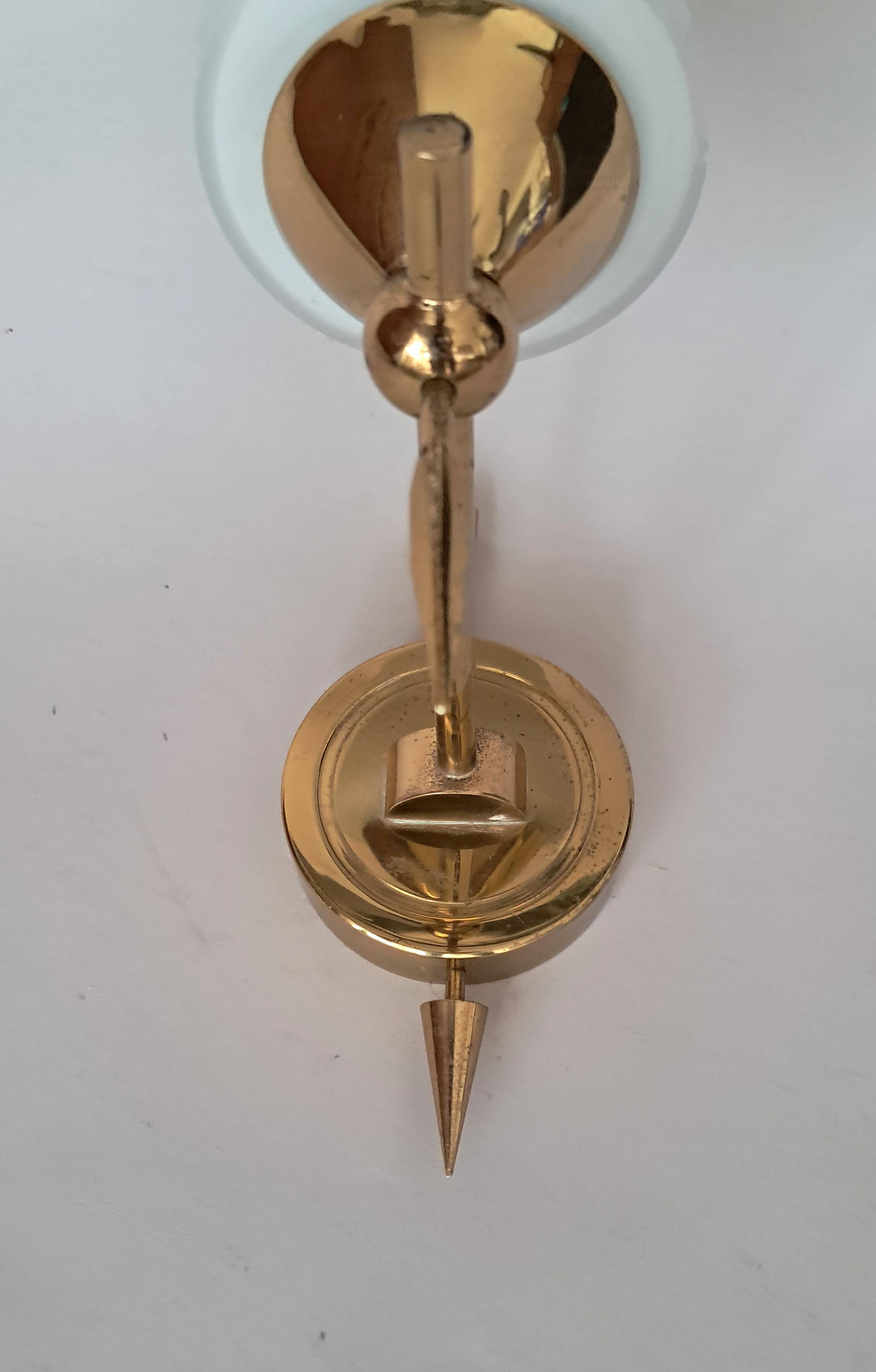 Wall lamp in gilded brass and white opaline, 1960.