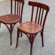 2 burgundy curved wooden bistro chairs from Ets Joseph Levallois