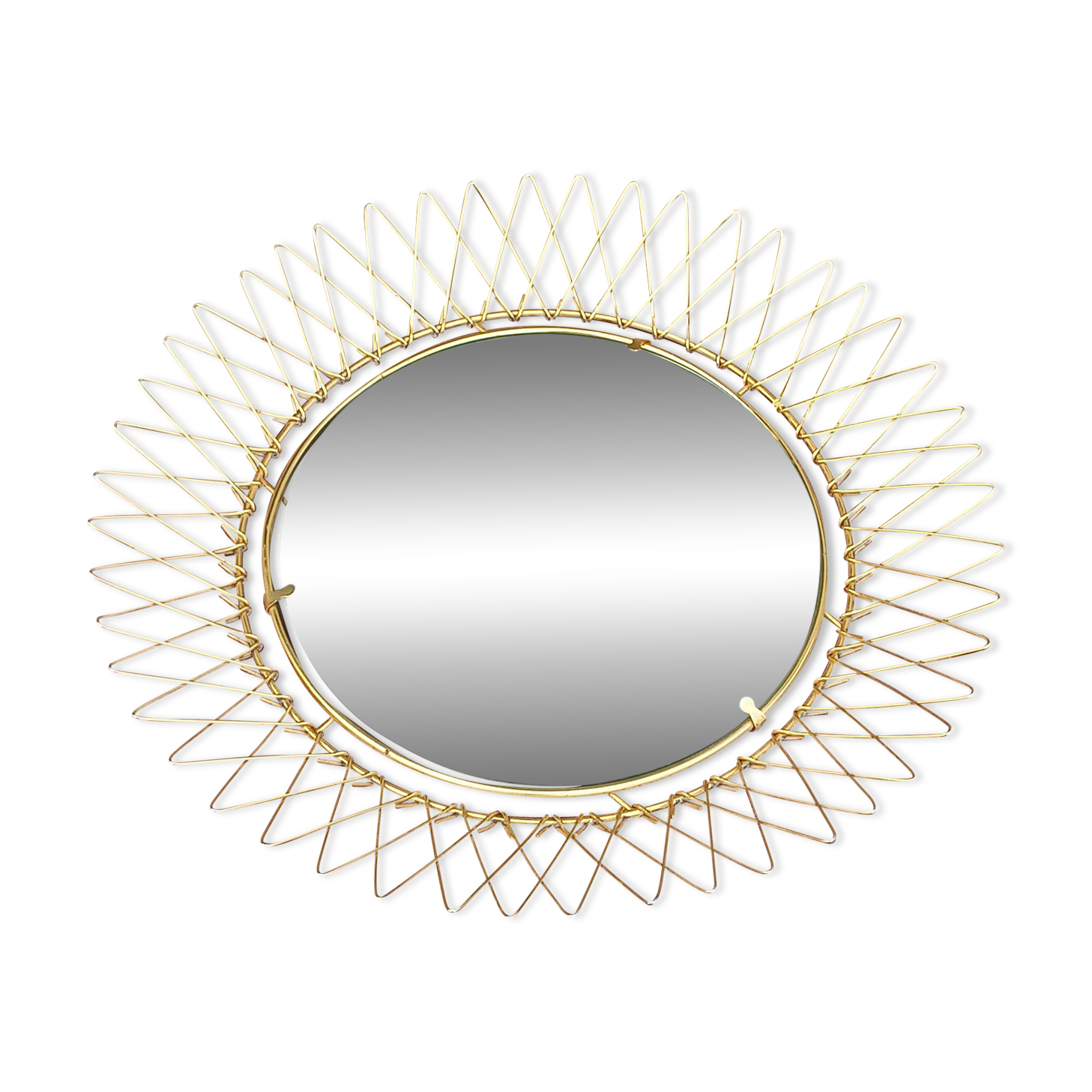 Vintage 1950s sun mirror in gold metal.