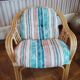 Rattan lounge with removable cushions