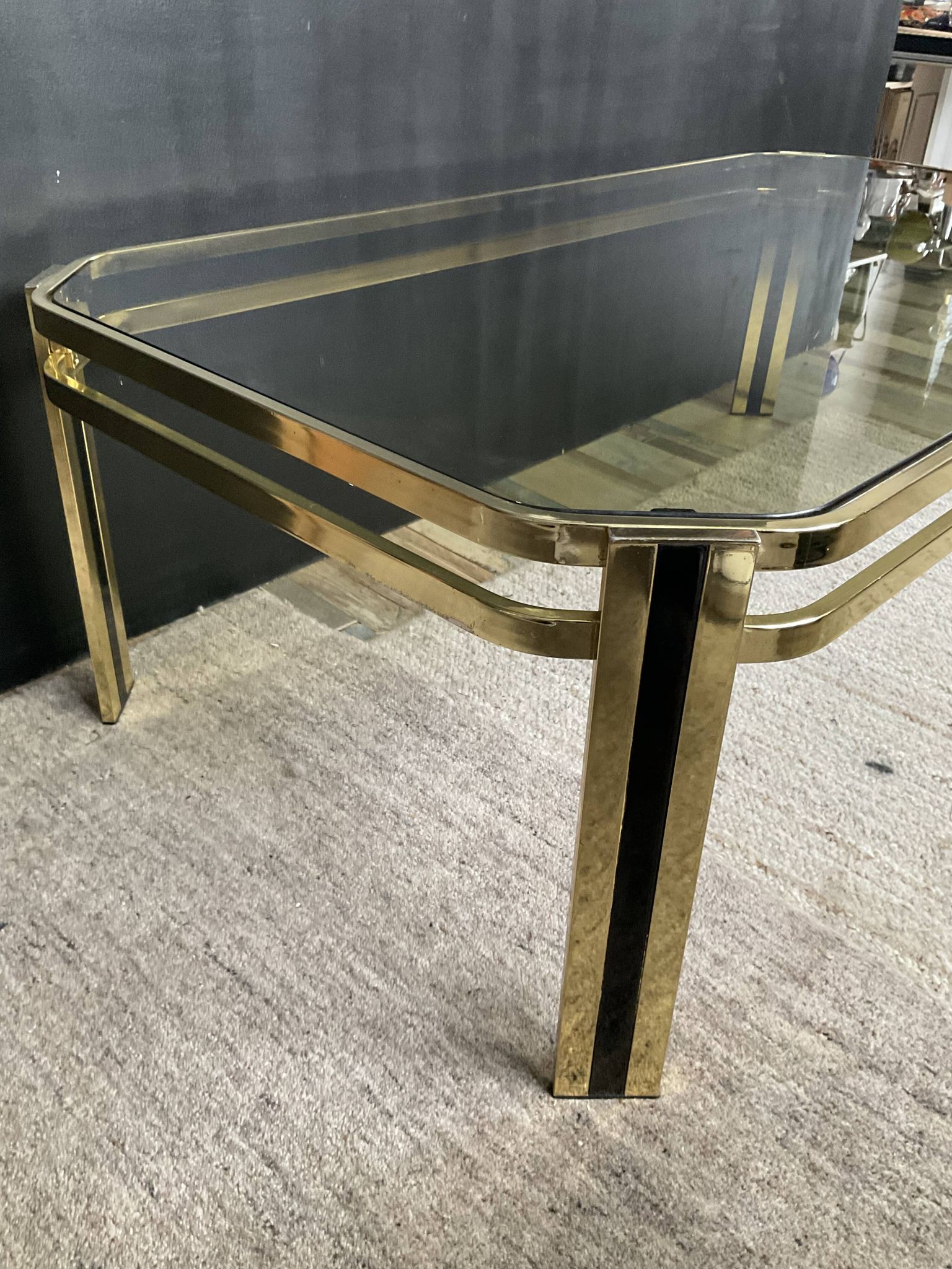 Vintage 1970s coffee table in gold metal and smoked glass.