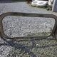Silver metal table with smoked glass top from the 1970s.