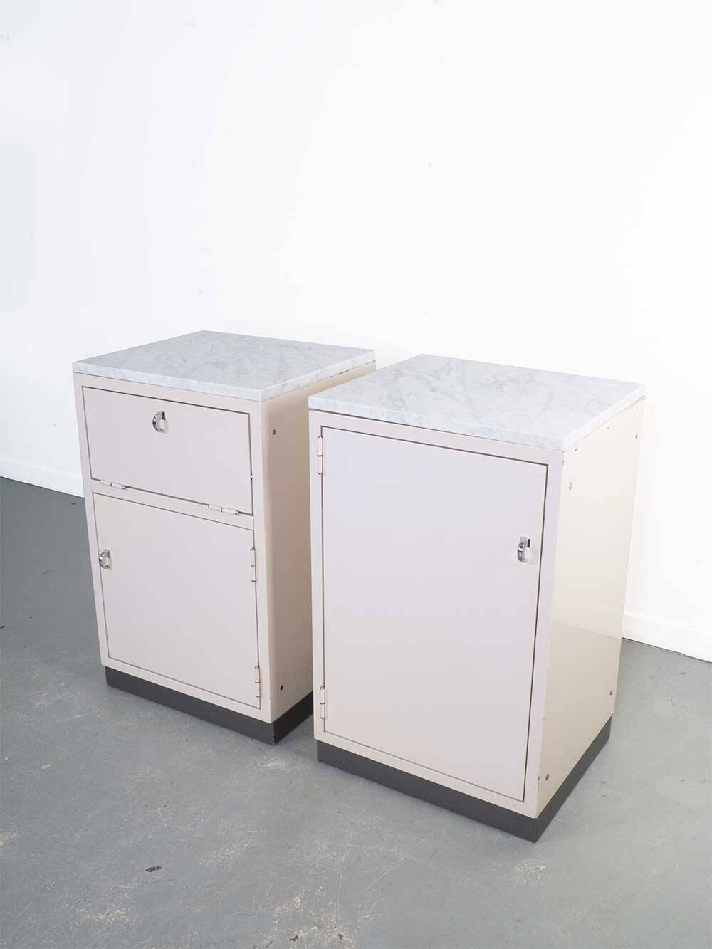 Set industrial cabinets with marble top.