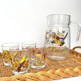 Vintage glass pitcher with birds