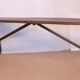 Old bench in Burmese teak with a wrought iron base.