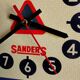 Vintage formica clock triangular silent wall clock "Sanders yellow"