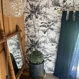 Carved wooden mirror in a bamboo style