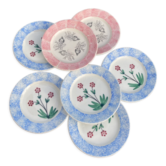 7 assiettes plates Sarreguemines à décor de fleurs multicolore