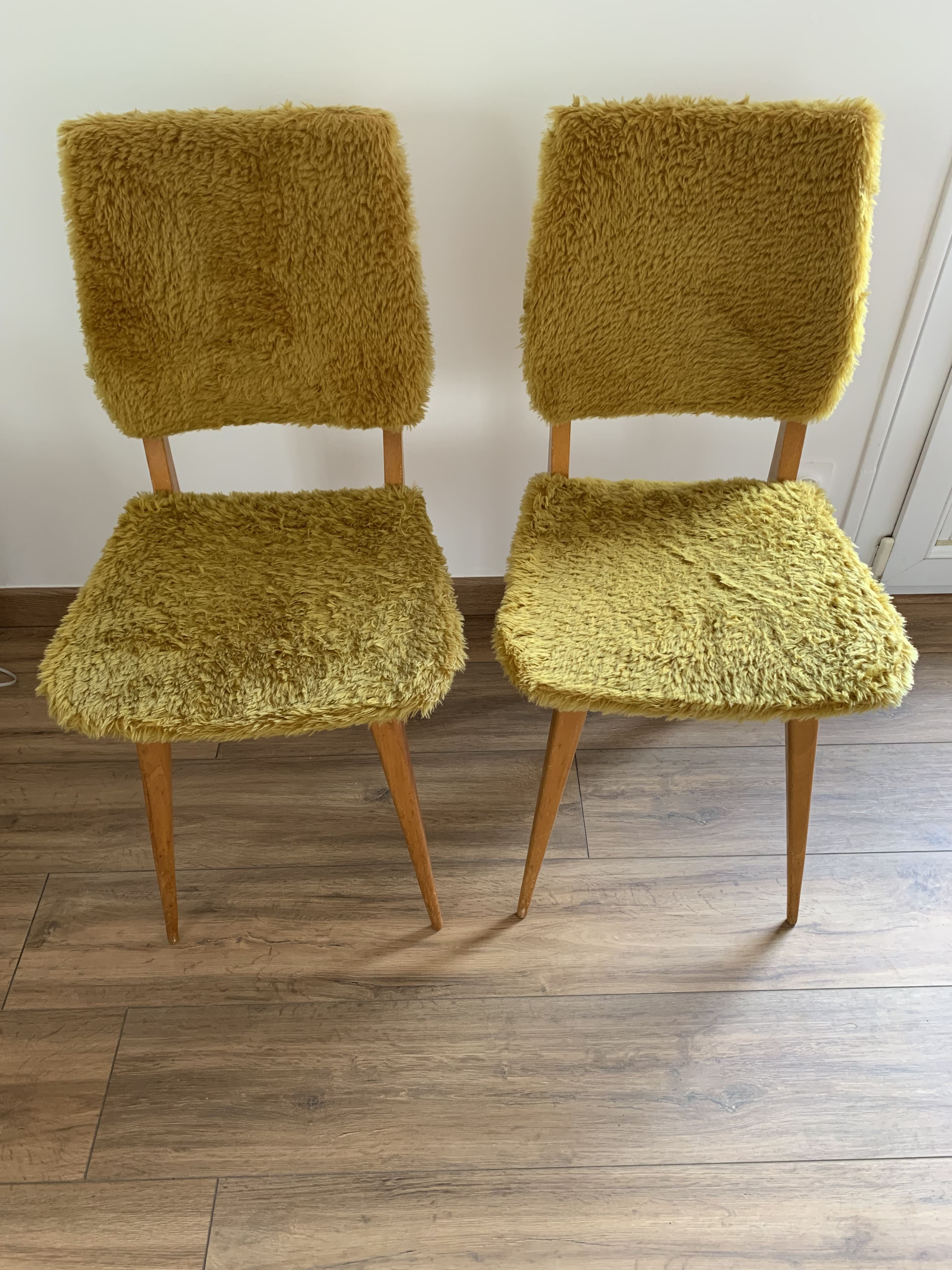 2 yellow moumoute chairs