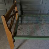 Bed with green metal braces 1960 a person foldable