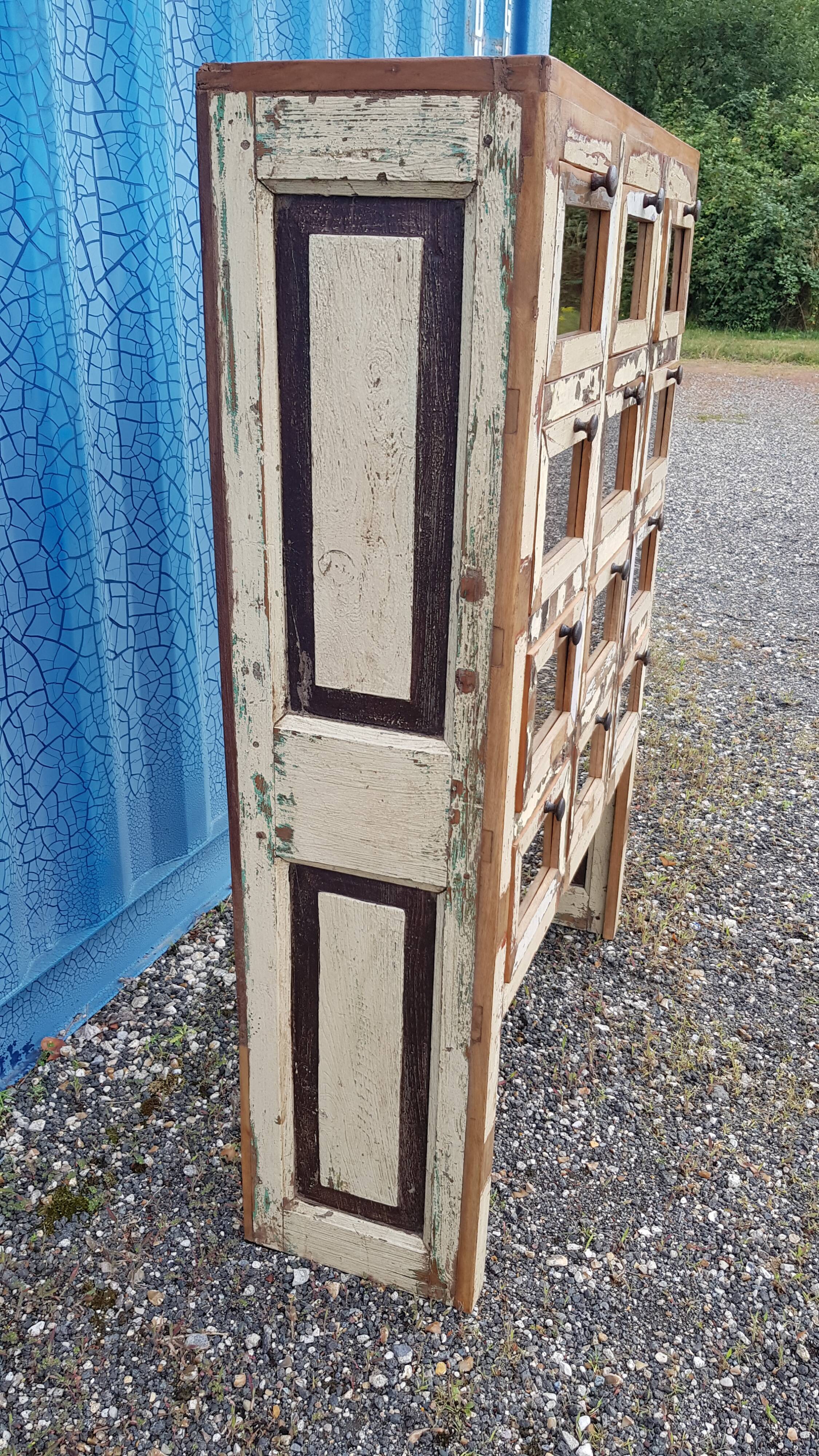 Merchant furniture - chest of drawers with 12 teak drawers