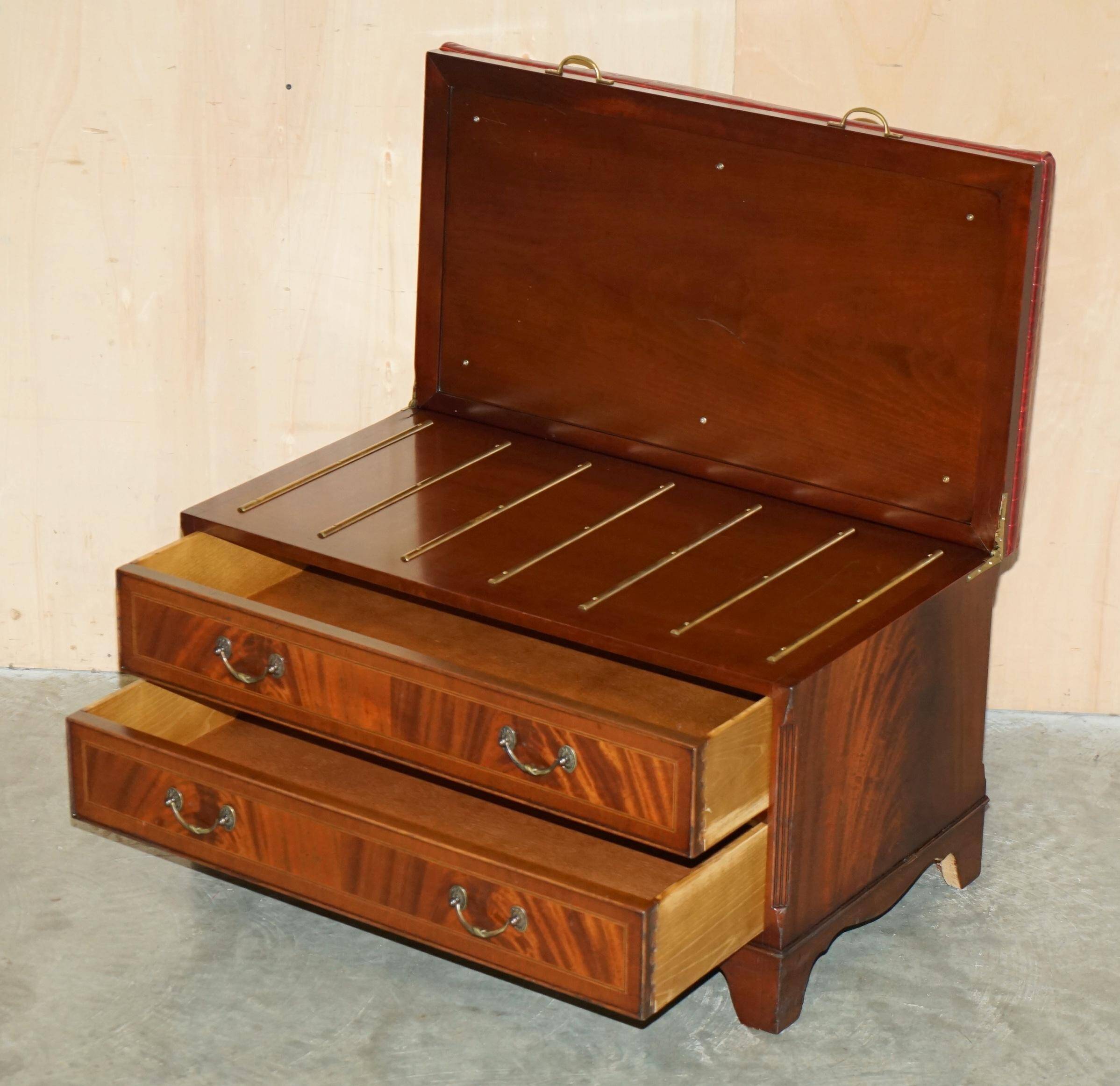 Crocodile leather and hardwood luggage rack in Mid-Century Modern style