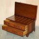 Crocodile leather and hardwood luggage rack in Mid-Century Modern style