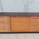 Workshop furniture with drawers and curtain in beech and walnut.