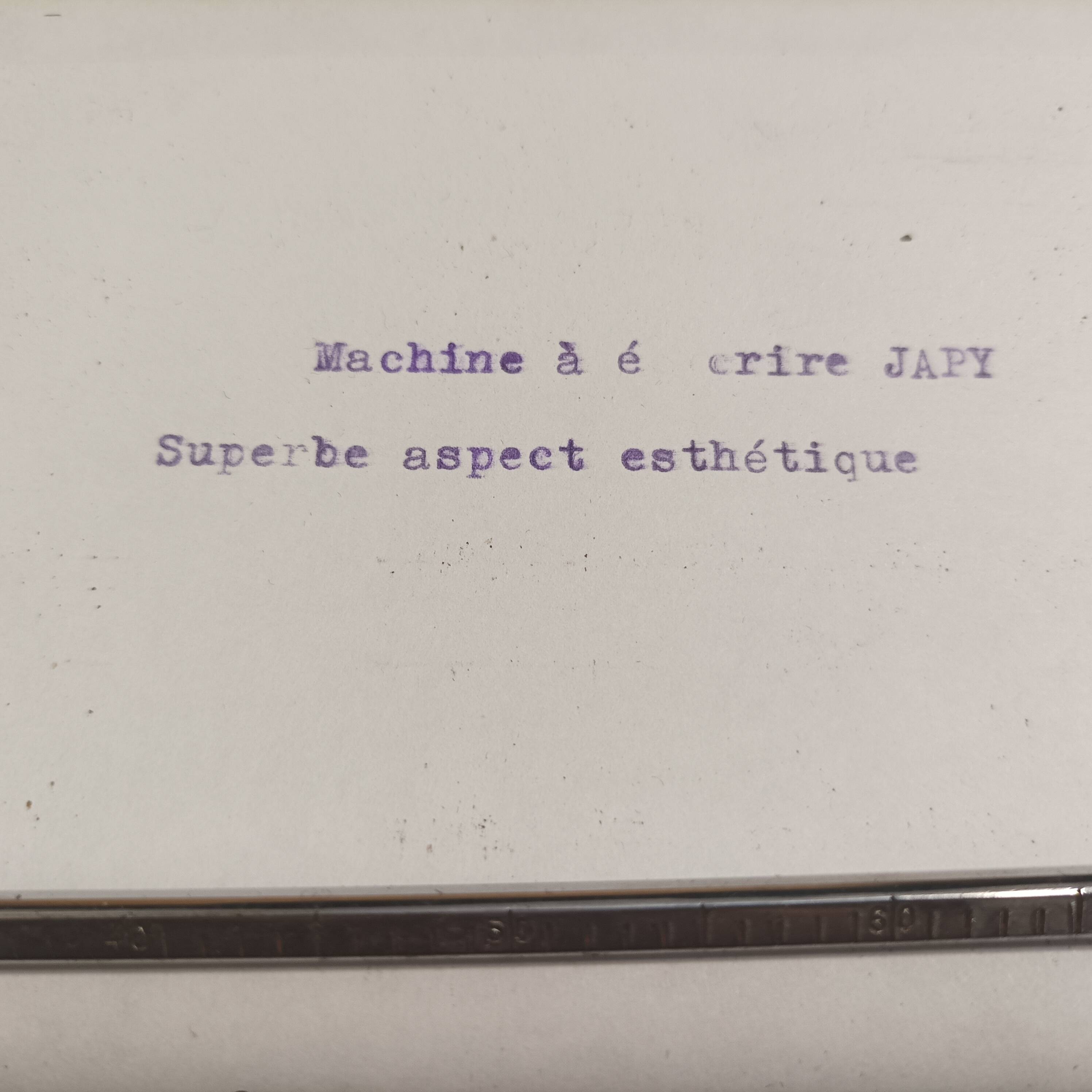 Japy portable typewriter, shiny black metal, 1950s