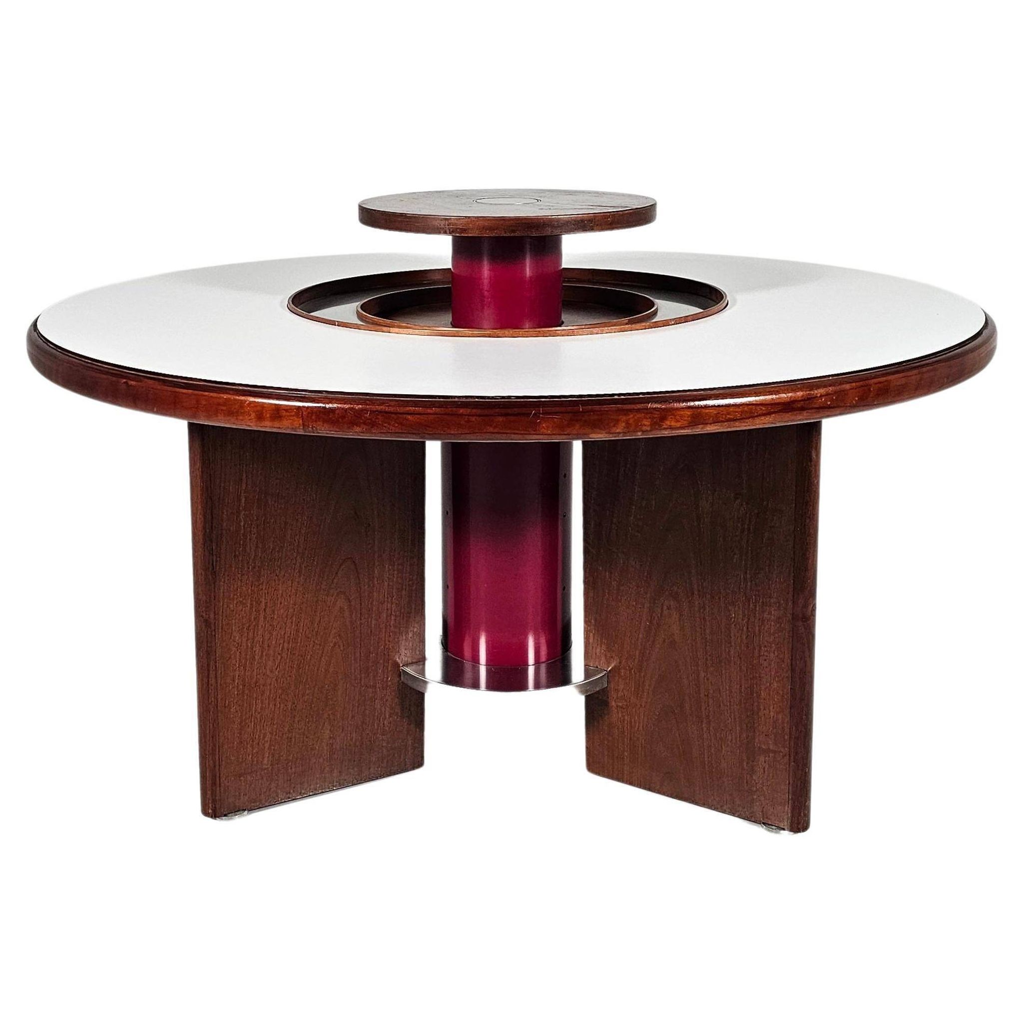 Dining table in walnut, laminate and steel by Silvio Coppola for Bernini, Italy.
