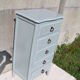 Chiffonnier gris 5 tiroirs en bois